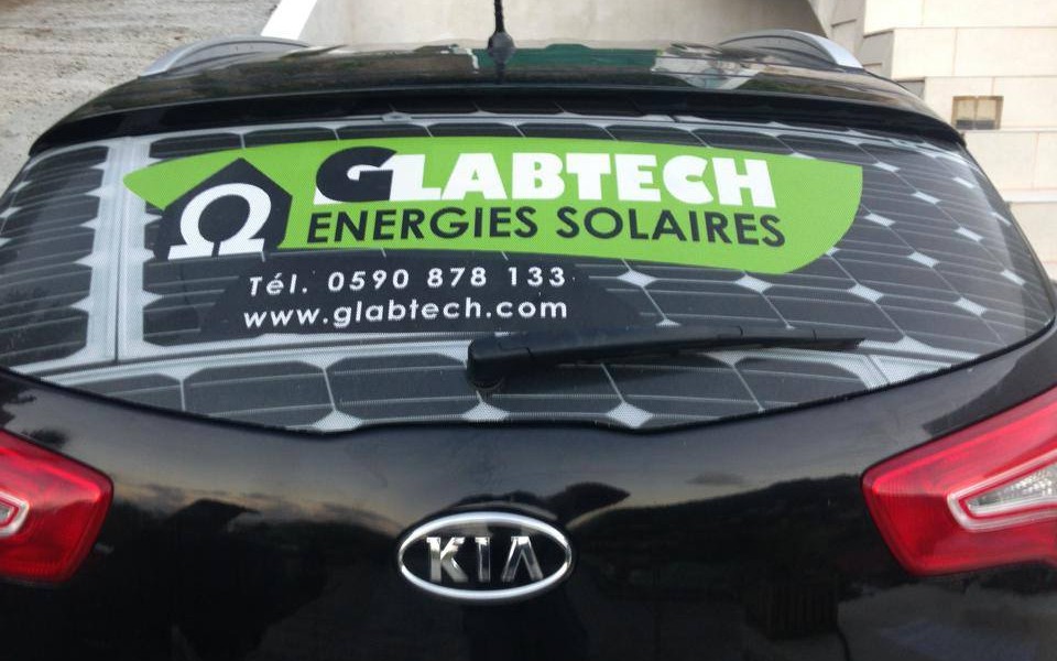 Impression imprimeur saint barth sbh st barth signalétique voiture colle vitre glabtech énergies solaires